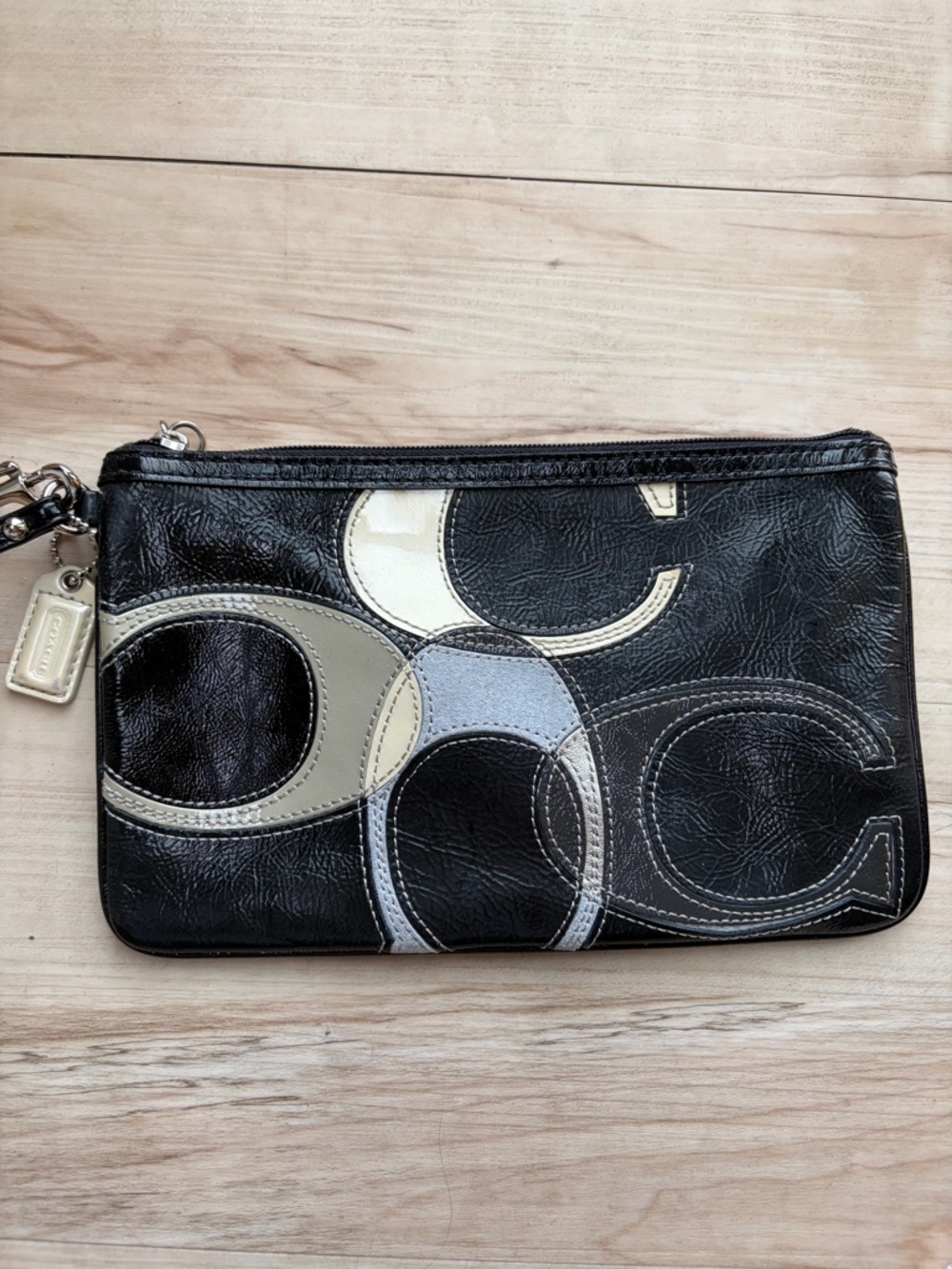Coach Black Leather Wristlet with Cream and Gray Signature Patchwork